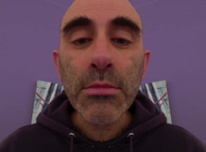 ricardo pinto with left hand side of face reflected