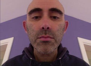 ricardo pinto with right hand side of face reflected
