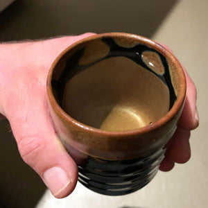 ricardo holding a japanese tea mug